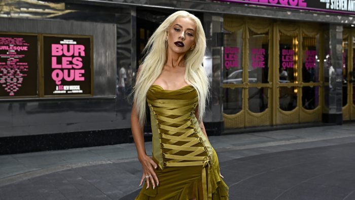 Christina Aguilera attends a photocall for "Burlesque: The Musical" at The Savoy Theatre