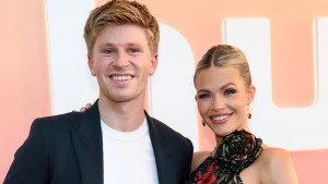 Robert Irwin and Witney Carson smiling at an event