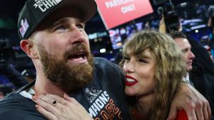 Travis Kelce #87 of the Kansas City Chiefs (L) celebrates with Taylor Swift after defeating the Baltimore Ravens in the AFC Championship Game at M&T Bank Stadium on January 28, 2024 in Baltimore, Maryland