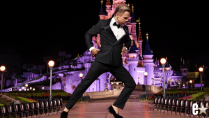 Derek Hough dancing outside of Disneyland